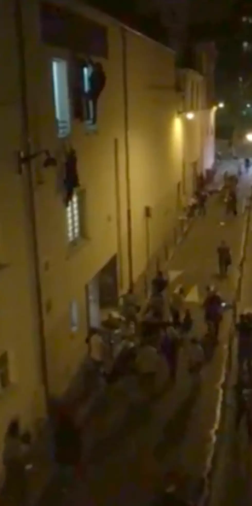 Paris Terrorist Attacks – Pregnant Woman Hangs on Side of Building [Video]