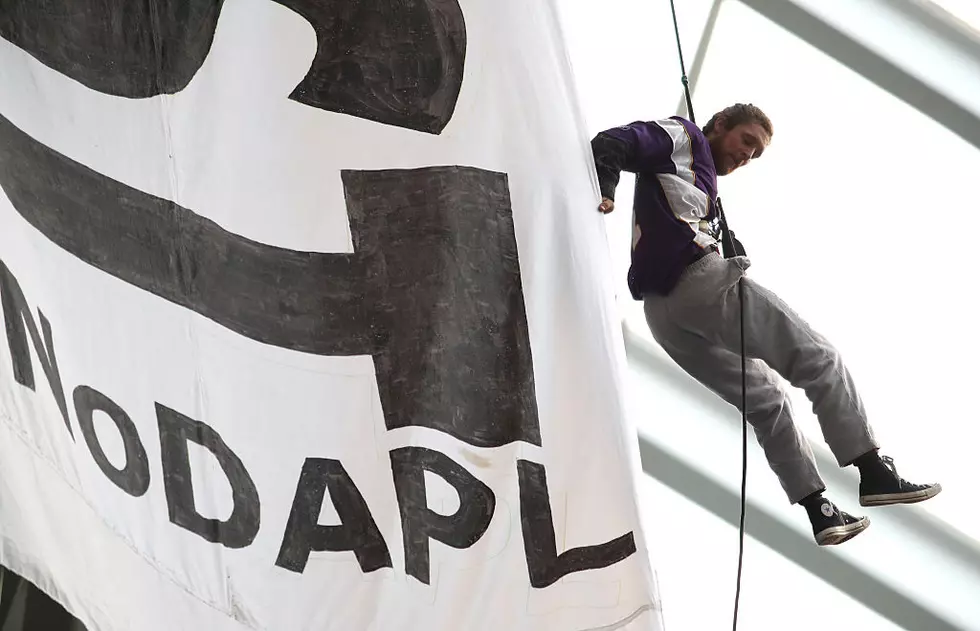 Protests Rappel from Banner During Today’s Vikings Game – Watch