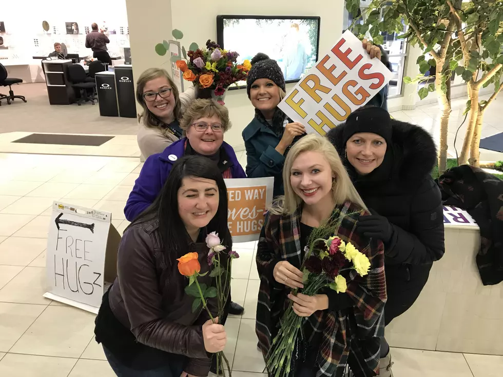 What It&#8217;s Like To Give Out &#8216;Free Hugs&#8217; And Flowers In Rochester