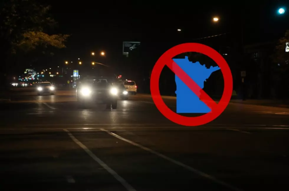 Is Flashing Your Headlights at Another Car Illegal in Minnesota?
