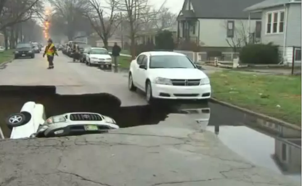 Check Out Chicago Sink Hole Swallows a Car [VIDEO]