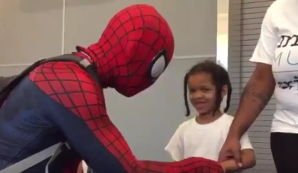 Spider-Man Visits Harvey Victims (video)