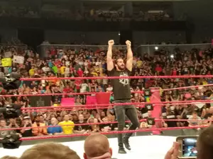 Brock Lesnar F-5s Seth Rollins on Stretcher