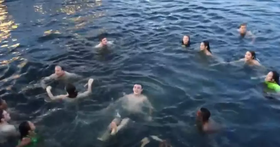 Cringe-Worthy Video Shows Chicago Tourists Cooling Off in Sewage Infested Water in Baltimore