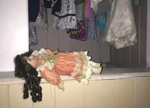 creepy doll in the hall