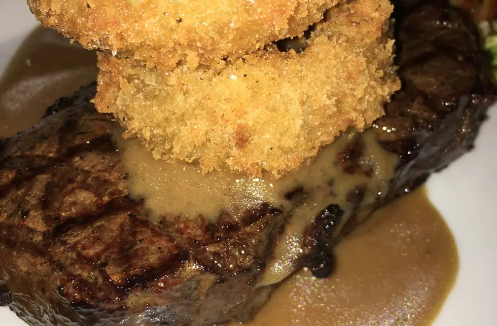 Rockford’s Juiciest Steak is Perfectly Topped with Insane Onion Rings