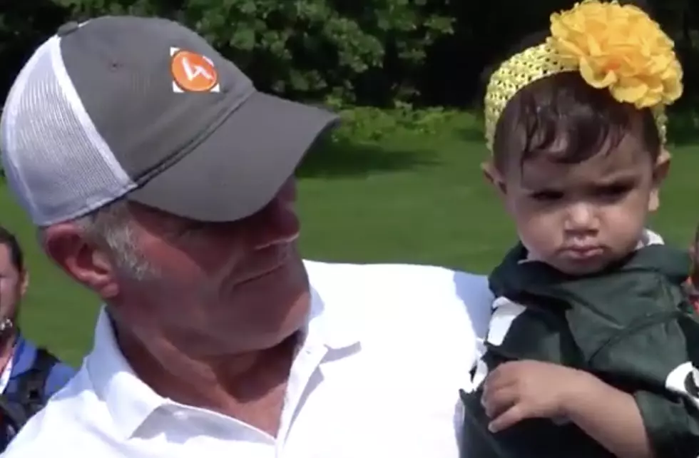 Brett Favre Meets His Biggest Fan and Almost Steals Her Kid