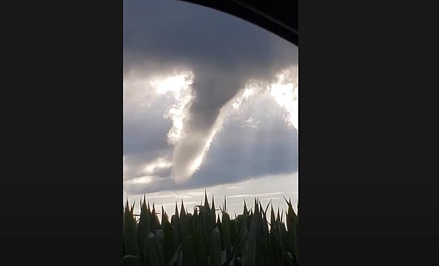 Illinois Couple Shares Video of Funnel Cloud as it Flies Over Them