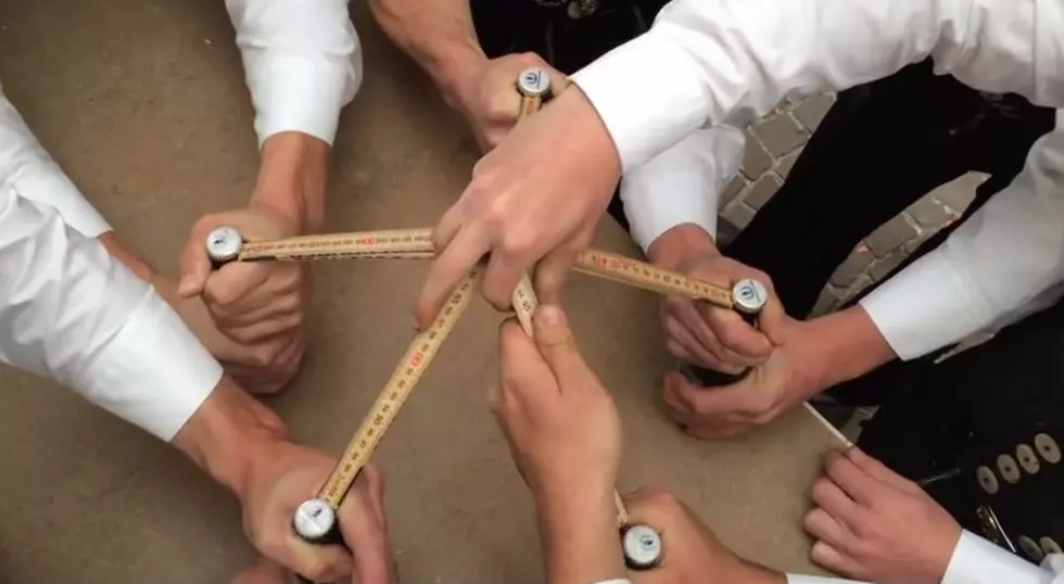 Crazy German Guys Open 5 Beers with Rulers [VIDEO]