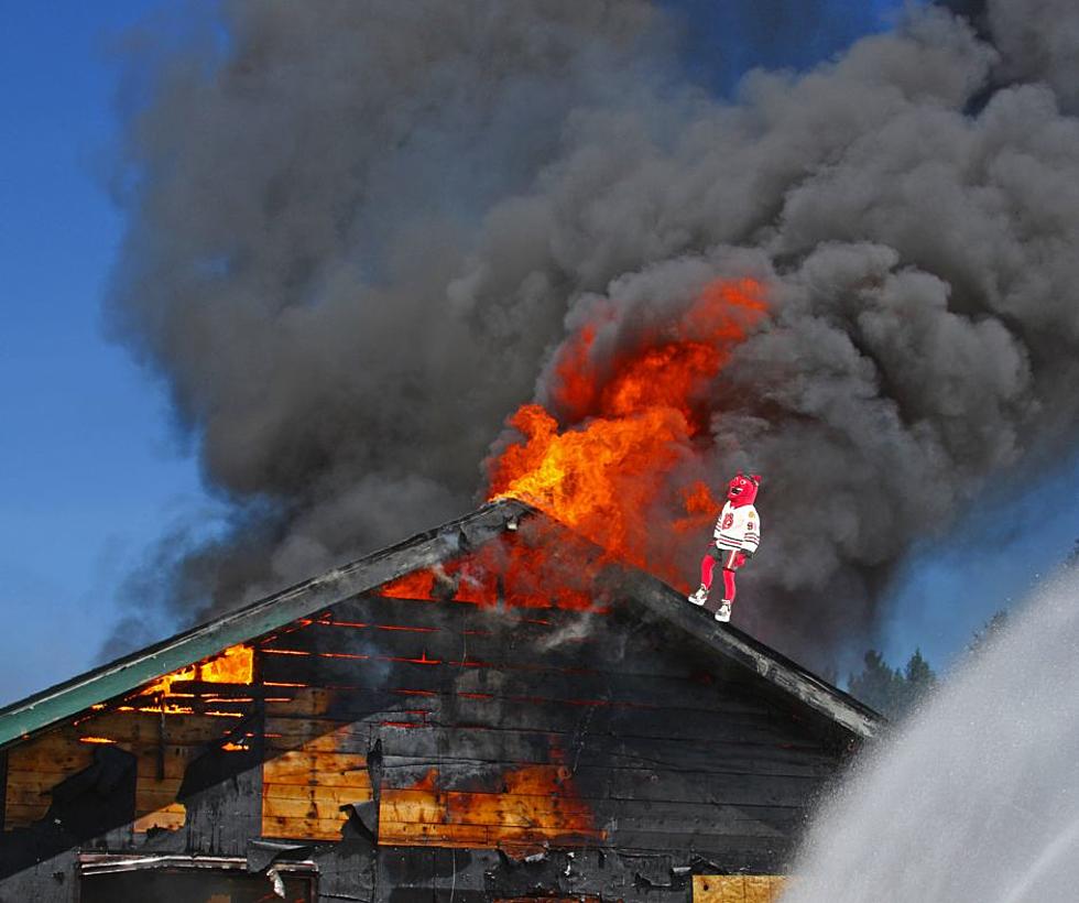 Wisconsin Fire Fighters Rescue Man From Roof of Home Engulfed in Flames