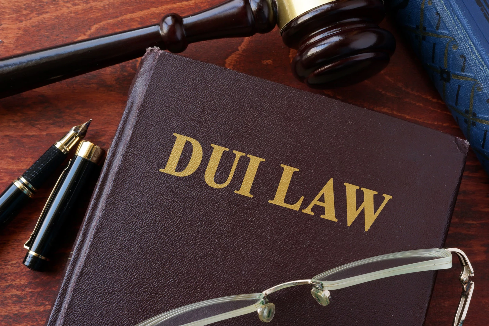 DUI Law title on a book and gavel. Driving under influence.