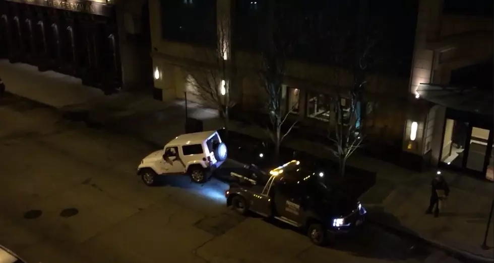 Jeep Driver Escapes from Tow Truck in Chicago [Watch]
