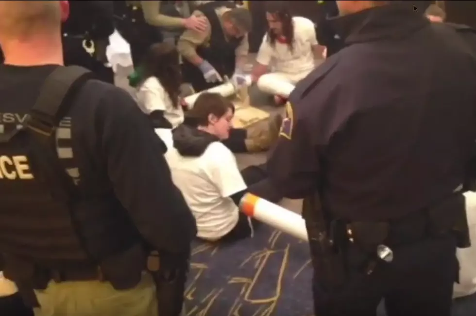 Trump Protesters Handcuff Themselves Inside PVC Pipes in Janesville Hotel Lobby  [Video]