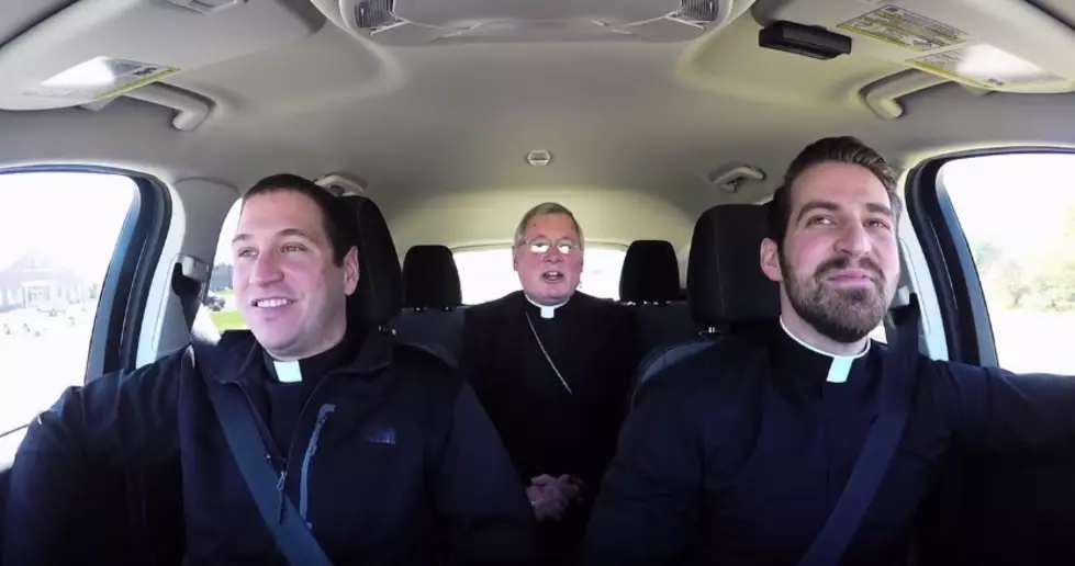 Rockford Priests and Bishop Sing ‘Go Cubs Go’ Carpool Karaoke Style