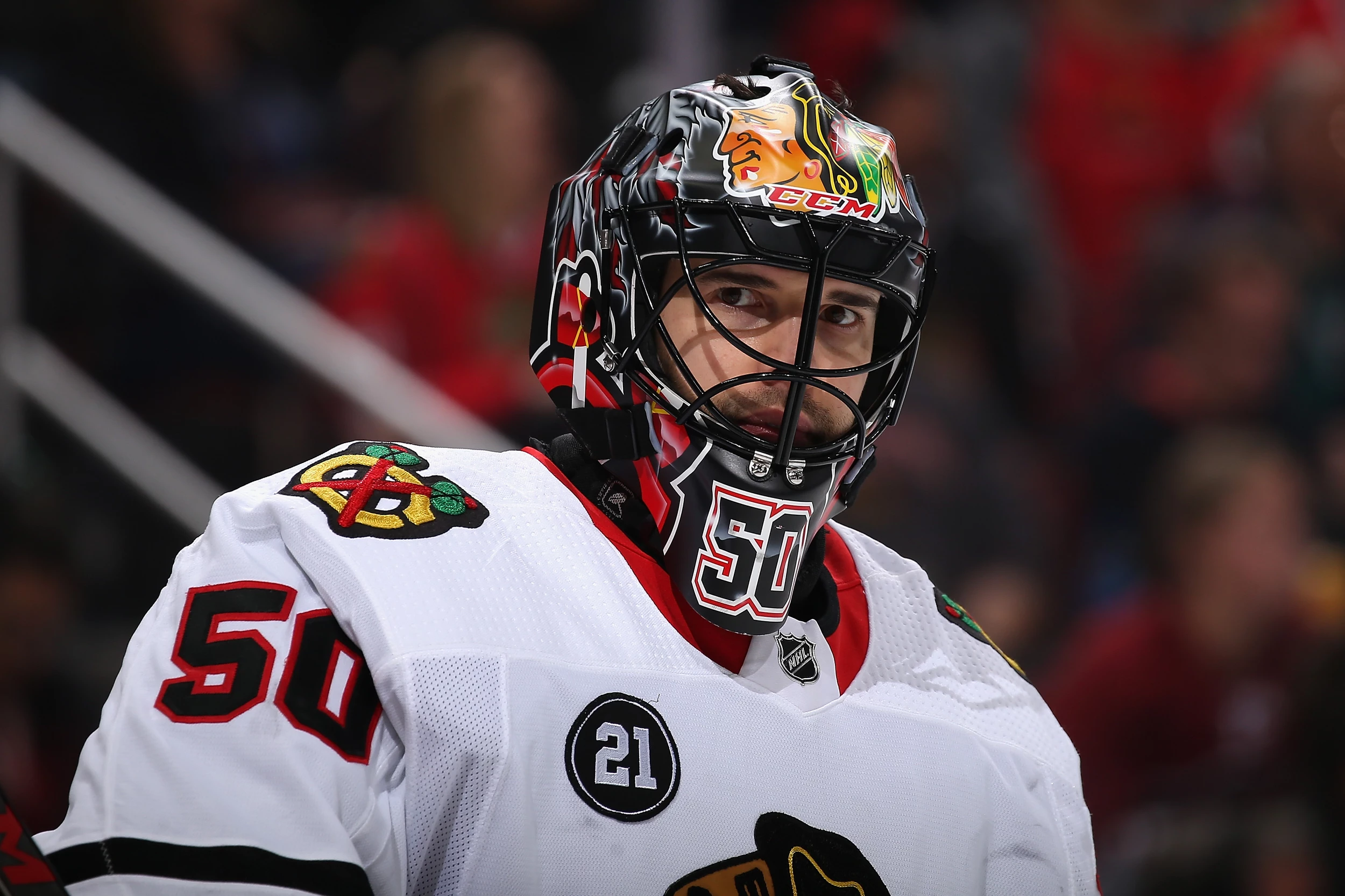 Corey Crawford's baby was rocking adorably small goalie pads at a