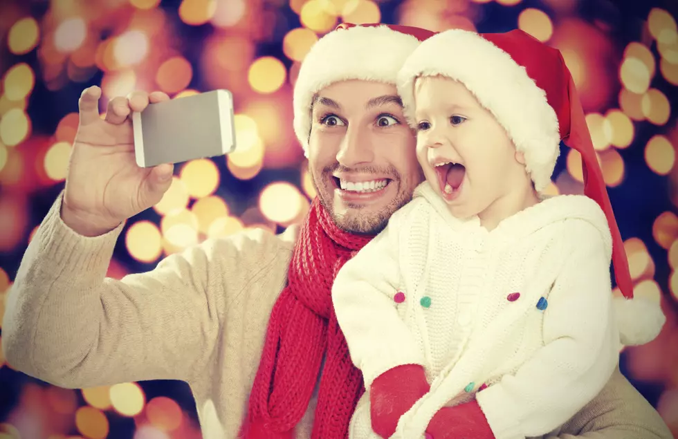 selfe in Christmas. happy family dad and daughter