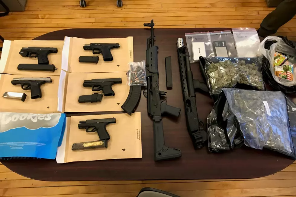 Rockford Man Arrested with 7 Firearms and Nearly 1000 Grams of Weed