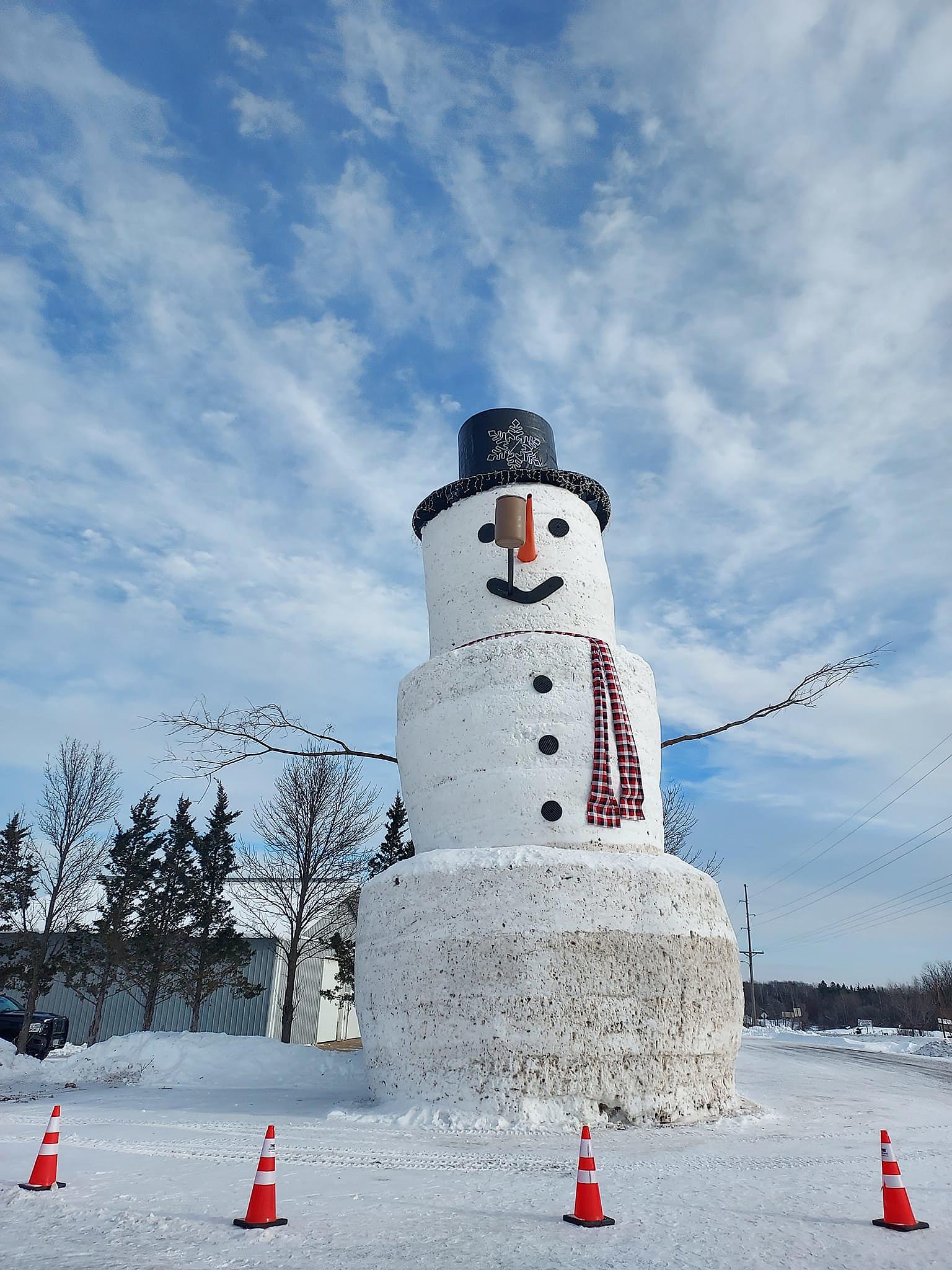 Family builds more than 40 foot tall, super-sized snowman in Milltown, Wis.