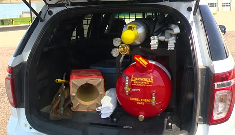 Cedar Falls Police Carrying Fire-Fighting Equipment [Video]