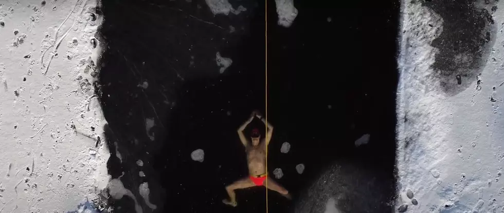 Man Sets Record for Swimming Under Frozen Lake (VIDEO)