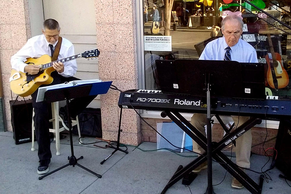 Who Are The Mystery Musicians You See Performing on Main Street