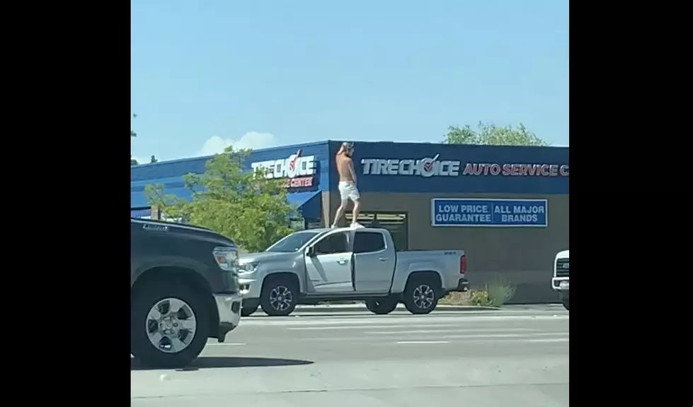 Man Strips, Dances On Top of Car in Boise Intersection [Video]