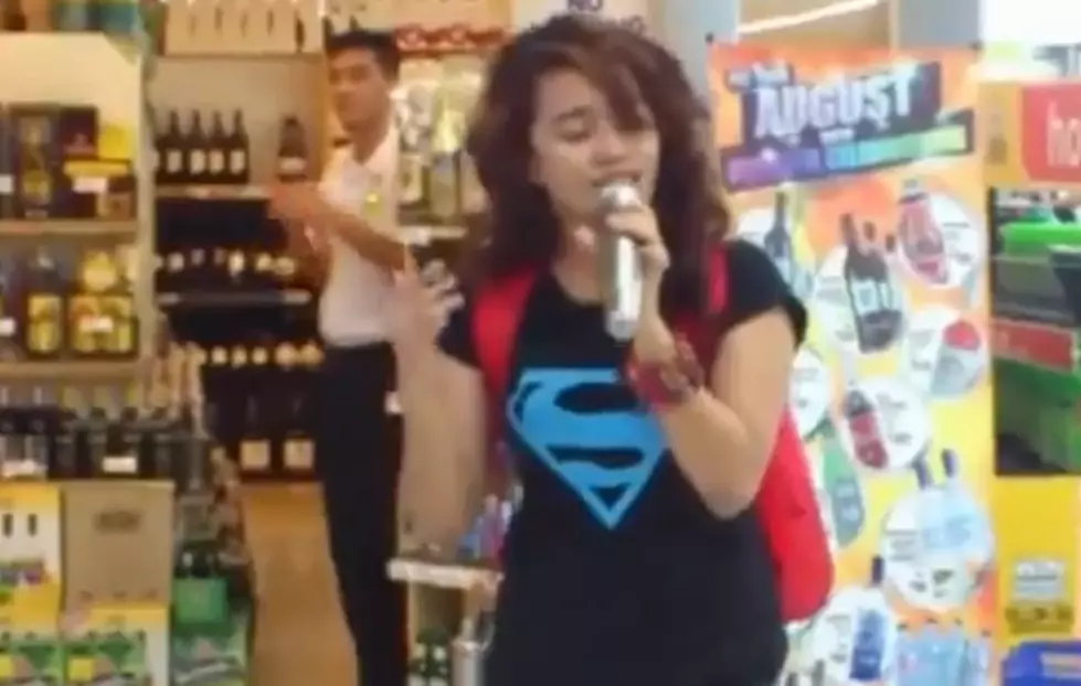 Girl Steps Up to a Karaoke Machine in the Middle of a Store and Blows Everyone Away