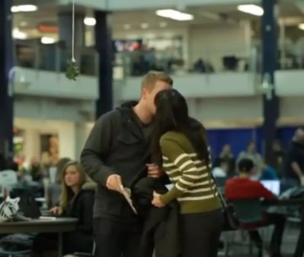 Pranksters Use Fake Survey to Kiss Strangers [VIDEO]