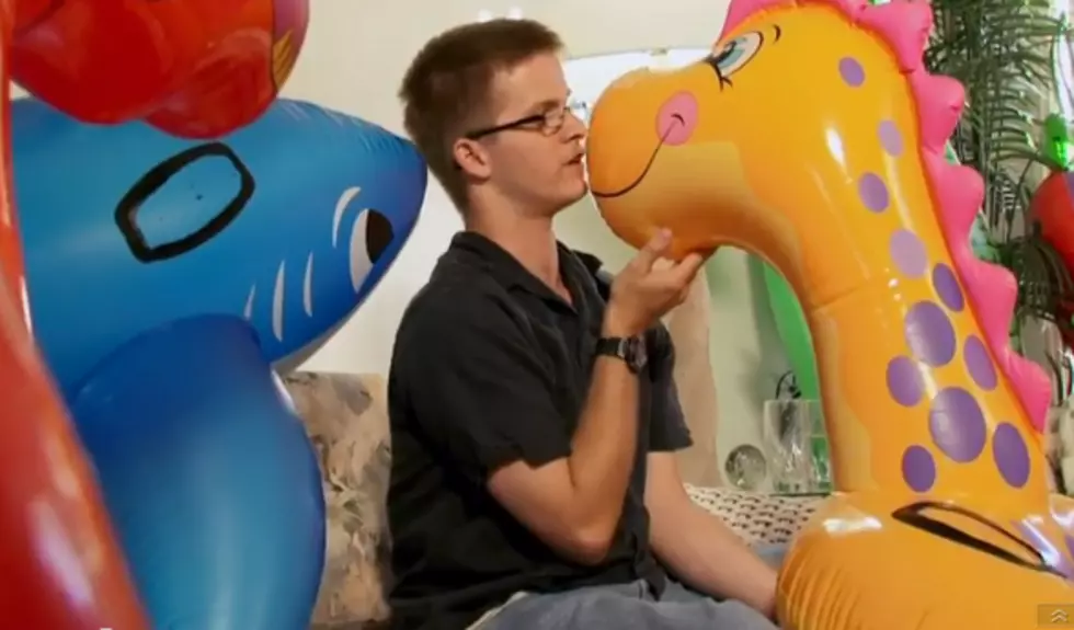 This Guy Is In a Relationship with 15 Inflatable Animals