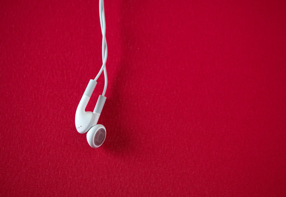Is It Rude to Wear Earbuds While Shopping? You Weighed In