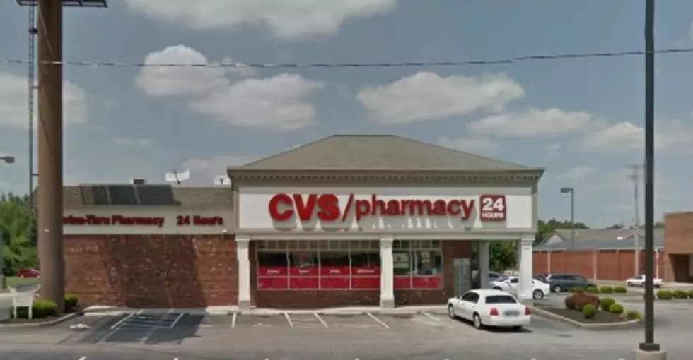 Evansville Fool Rolls Around on Ground in Evansville Pharmacy