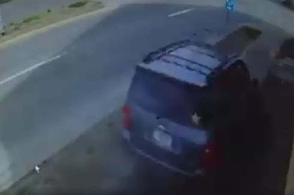 Surveillance Footage of SUV Crashing into Building Near Bar (VIDEO)
