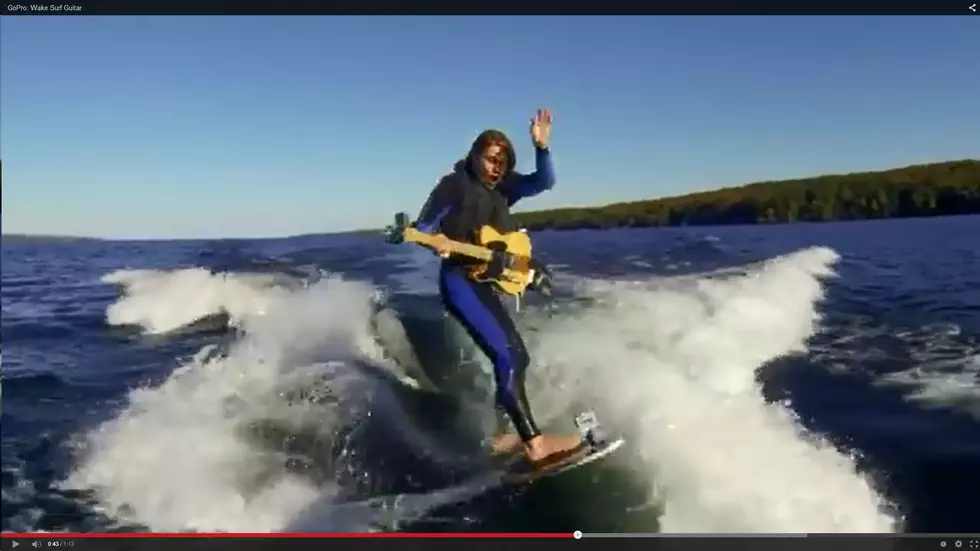 Watch this Guitar Player Surf and Shred 