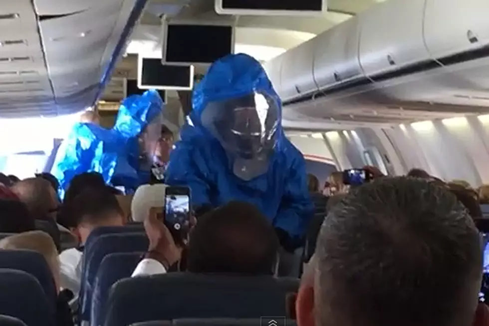 Ebola Prank Leads to Terrifying Hazmat Scene on Airplane [VIDEO]