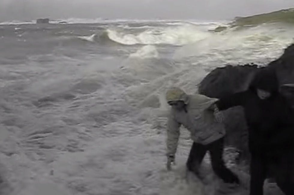 Elderly Couple Dramatically Saved After Violent Waves Sweep Them Away
