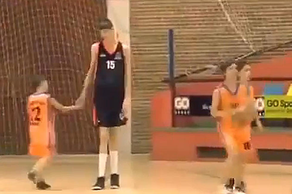 13-Year-Old, 7-Foot-4 Basketball Player [Video]