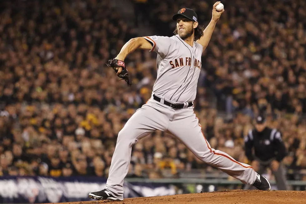 Brandon Crawford's grand slam backed the four-hit pitching of Madison Bumgarner