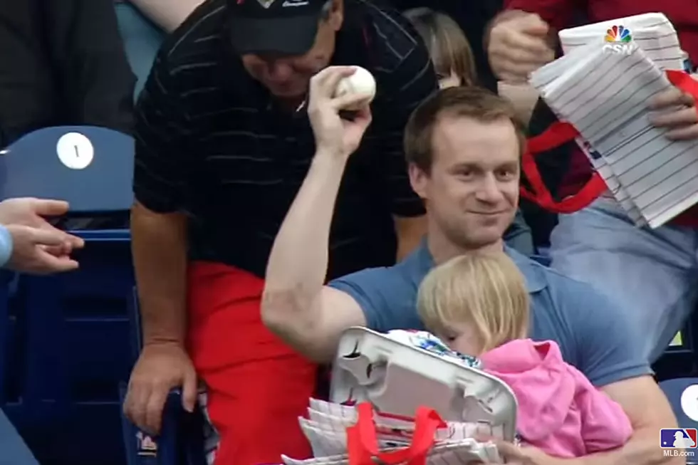 Dad Holding Child Makes Supremely Casual One-Handed Foul Ball Catch