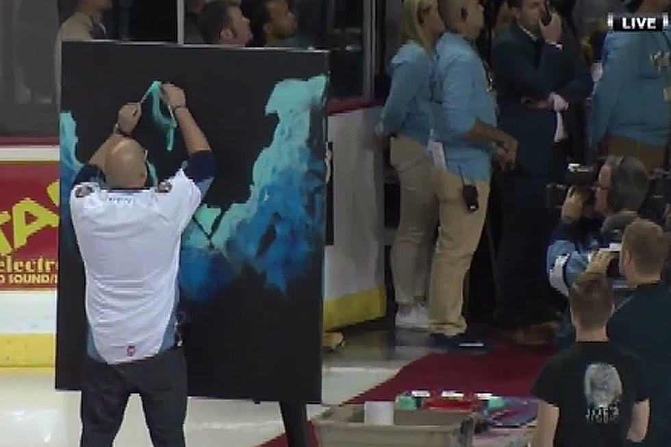 Artist Paints Picture During Hockey Game National Anthem