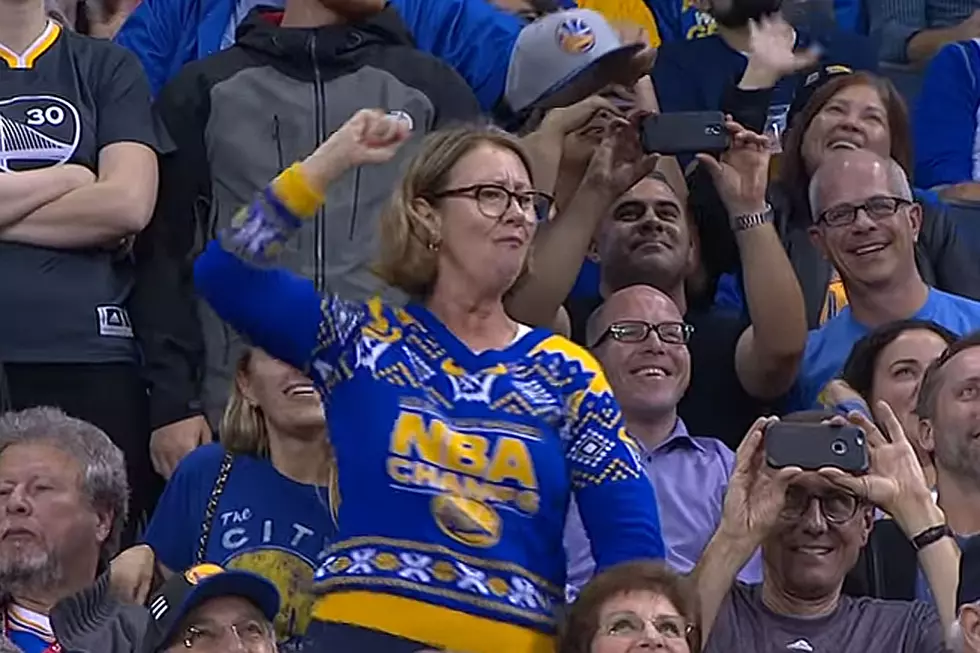 Dancing Ugly Christmas Sweater-Wearing Warriors Fan Is Beyond Awesome