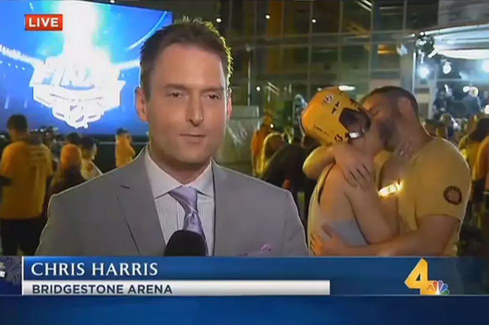 Couple on a Mission Makes Out Like Nobody’s Business During Live Report on Predators Win