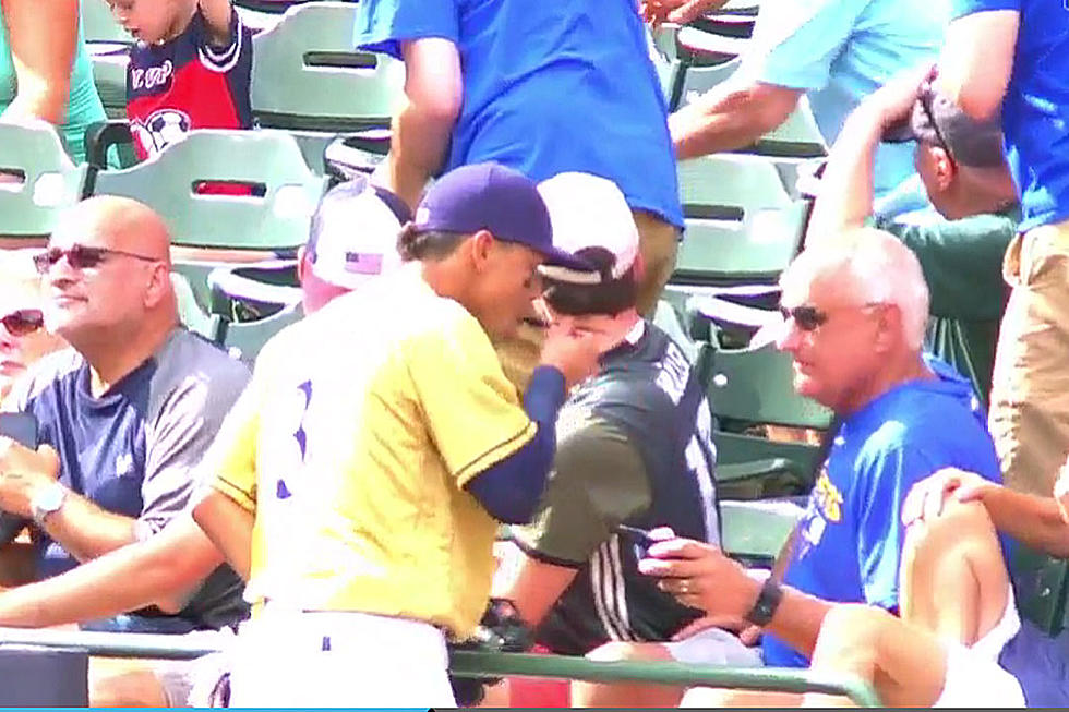 Watch Brewers SS Orlando Arcia Steal Unsuspecting Fan&#8217;s Ice Cream While Chasing Foul Ball