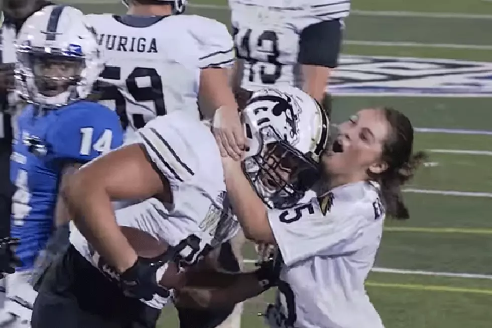 Woman Runs Onto Field When Brother Scores TD During 7-OT Game