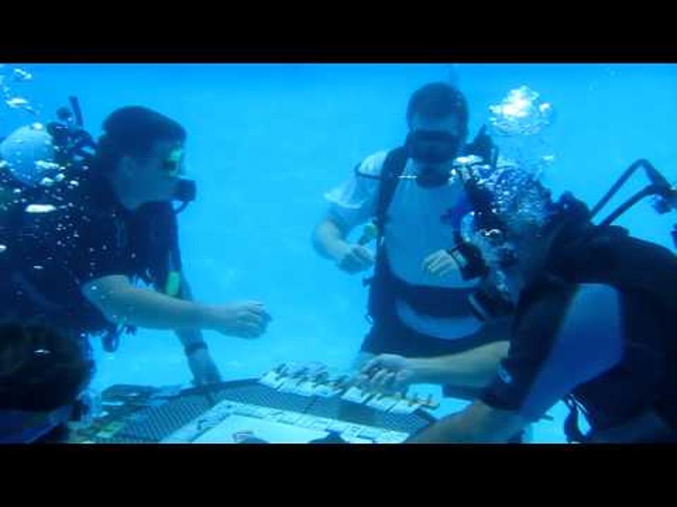 Dave Spencer Plays Monopoly Underwater at Dive Center Charity Event [VIDEO]