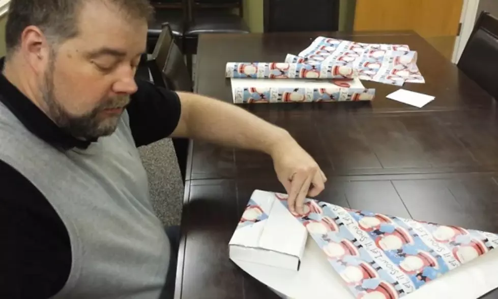 Dave Spencer Tries Gift Wrap Life Hack, Proves HE’S a Hack [VIDEO]