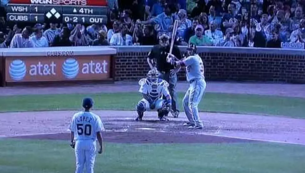 Guy Catches Ball While Holding Baby