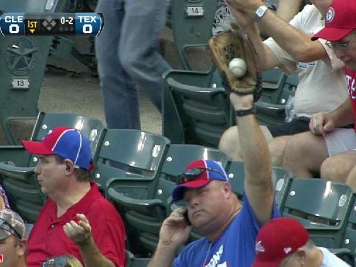 Young Rangers fan makes awesome snag on screaming foul ball