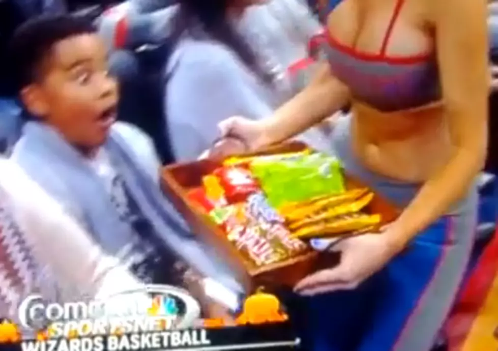 Young Fan Stares At Cheerleader’s Chest [VIDEO]