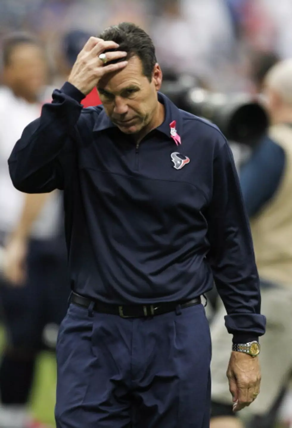 Texans Coach to Stay in Hospital