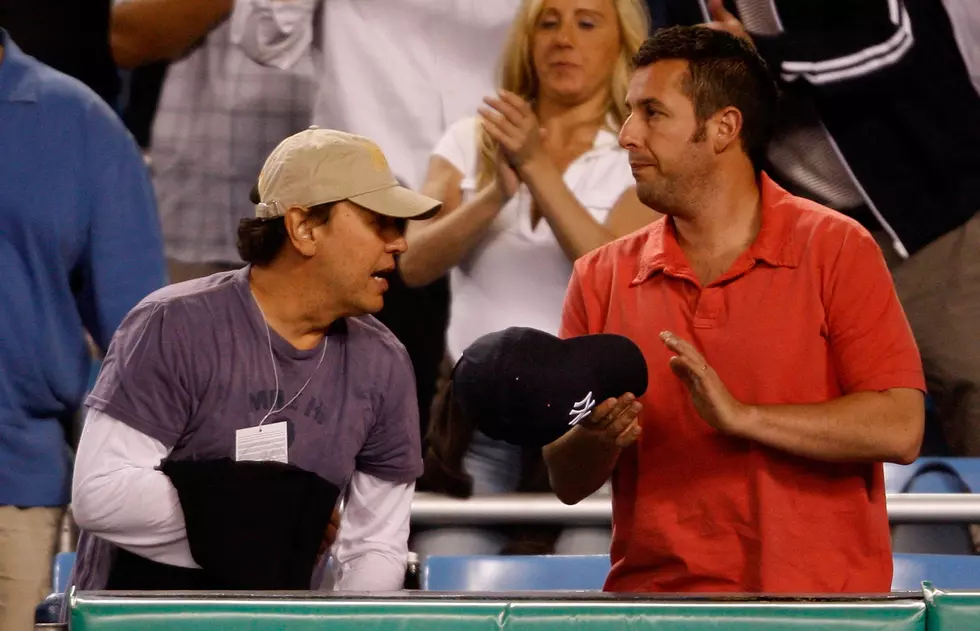 Sandler with Billy Crystal at Yankee Stadium / Getty Images
